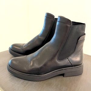 Franco Sarto casual leather slip on black ankle boots with a rubber heel.